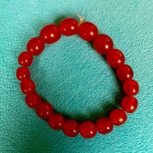 Nice orangy bead bracelet made by me with stretchy cord:))